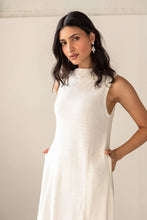 Load image into Gallery viewer, Woman wearing a white dress against a plain background
