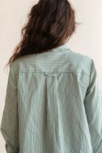 Load image into Gallery viewer, Person wearing a green and white striped shirt against a plain background