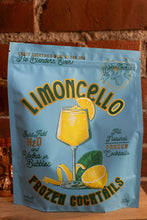 Load image into Gallery viewer, Packaging of Limoncello frozen cocktails with lemon illustrations on a wooden surface.