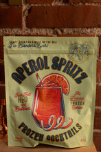 Load image into Gallery viewer, Aperol Spritz frozen cocktail package with a brick wall background