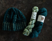 Load image into Gallery viewer, yarn hanks with knit hat