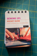 Load image into Gallery viewer, Sewing 101 pocket guide on a green cutting mat
