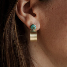 Load image into Gallery viewer, Close-up of an ear wearing a turquoise stud earring with a gold hoop.