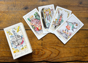 tarot cards on wood tabletop