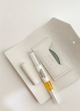 Load image into Gallery viewer, Makeup tool set with a brush and applicator on a light gray background