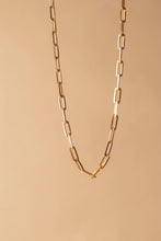 Load image into Gallery viewer, Gold chain necklace on a beige background