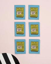 Load image into Gallery viewer, Six blue cards with yellow text on a pink background