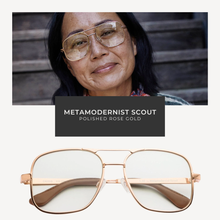Load image into Gallery viewer, Rose gold sunglasses with a woman wearing them, brand 'Metamodernist Scout' displayed.