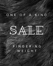 Load image into Gallery viewer, Text 'One of a Kind Sale Fingering Weight' on a textured black and white background