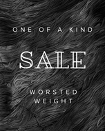 Text 'One of a Kind Sale Worsted Weight' on a textured black and white background