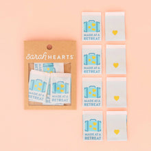 Load image into Gallery viewer, Packaging of 'Sarah Hearts' stickers with travel-themed designs on a pink background