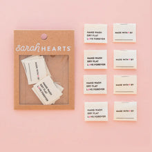 Load image into Gallery viewer, Packaging of 'Sarah Hearts' with small cards on a pink background
