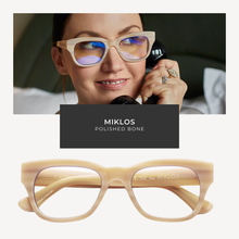 Load image into Gallery viewer, Woman wearing cat-eye glasses with 'Miklos Polished Bone' label, glasses displayed below.