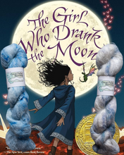 Load image into Gallery viewer, Book cover of &#39;The Girl Who Drank the Moon&#39; with yarn and moon in background