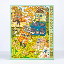 Load image into Gallery viewer, Colorful puzzle box with cartoon houses and music-themed design, featuring the brand 'Birdie Puzzles'.