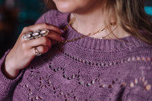 Load image into Gallery viewer, Person wearing a purple sweater and gold necklace with a blurred background