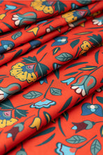 Load image into Gallery viewer, Colorful floral pattern on red fabric