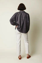 Load image into Gallery viewer, Person wearing a dark gray shirt and white pants against a plain background