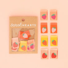 Load image into Gallery viewer, Packaged strawberry-themed items with &#39;sarah Hearts&#39; branding on a pink background
