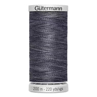 A spool of Gutermann sewing thread in a dark heathered navy blue color, shown against a plain white background.