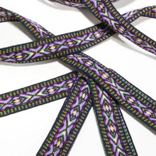 Load image into Gallery viewer, Purple ribbon with a pattern of small shapes on a white background