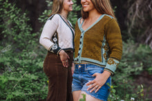 Load image into Gallery viewer, Two women wearing patterned cardigans standing outdoors with a natural background