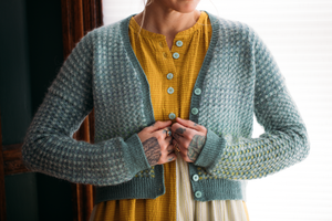 woman wearing knit sweater