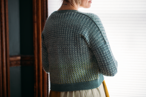 woman wearing knit sweater