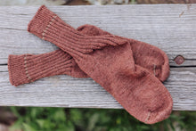 Load image into Gallery viewer, Pair of brown knitted socks on a wooden surface with a natural background
