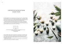 Load image into Gallery viewer, Crocheted baubles from scrap yarn on a textured surface with text on the left.