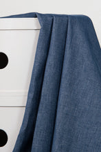 Load image into Gallery viewer, Blue fabric draped over a white cabinet with black knobs.