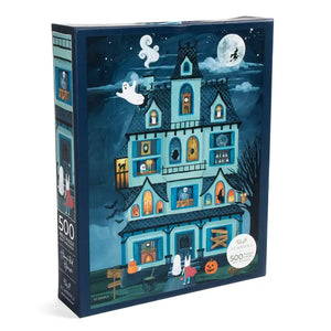 Halloween-themed puzzle box with a haunted house illustration on a white background