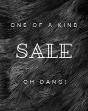 Load image into Gallery viewer, Text 'ONE OF A KIND SALE OH DANG!' on a textured black and white background