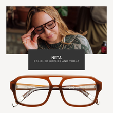 Load image into Gallery viewer, Brown eyeglasses with 'NETA' branding on a white background