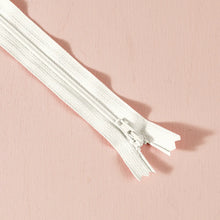 Load image into Gallery viewer, White zipper on a pink background