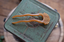 Load image into Gallery viewer, Decorative hair clip on a green ceramic surface