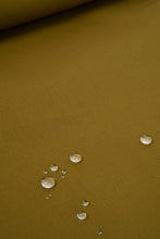 Load image into Gallery viewer, Water droplets on a textured brown surface