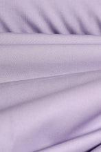 Load image into Gallery viewer, Close-up of purple fabric with folds