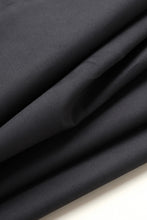 Load image into Gallery viewer, Close-up of black fabric with folds