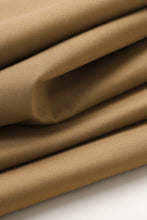 Load image into Gallery viewer, Close-up of folded brown fabric on a light background