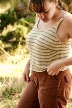 Load image into Gallery viewer, Woman wearing a striped tank top and brown pants in a natural setting