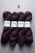 Load image into Gallery viewer, Four skeins of dark purple yarn with labels on a gray background