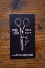 Load image into Gallery viewer, Scissor-shaped slippy scissors and stitch marker on a black card with branding information.