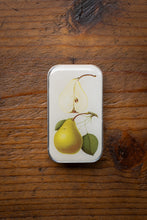 Load image into Gallery viewer, Small tin box with pear illustration on a wooden surface