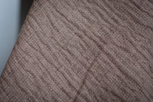 Load image into Gallery viewer, Close-up of textured brown fabric with a subtle pattern