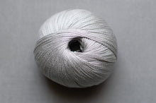 Load image into Gallery viewer, Gray skein of yarn on a gray background
