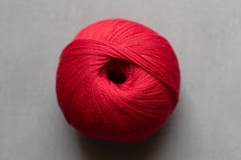 Load image into Gallery viewer, Red ball of yarn on a gray background