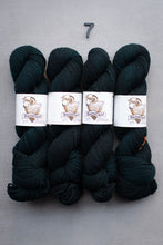 Load image into Gallery viewer, Four skeins of dark green yarn with labels on a gray background