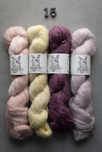 Load image into Gallery viewer, Four skeins of yarn in pink, yellow, purple, and lavender on a gray background with 'Old Dingle' labels.