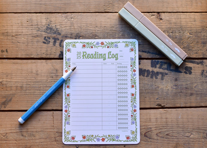 2025 reading log with pen